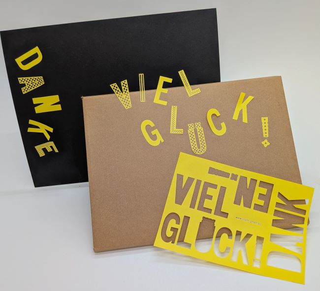 Buchstaben-Etiketten filigran gelasert