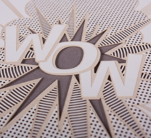 "WOW" - filigraner Lasercut in Naturpapier - Entwurf Clormanndesign.de